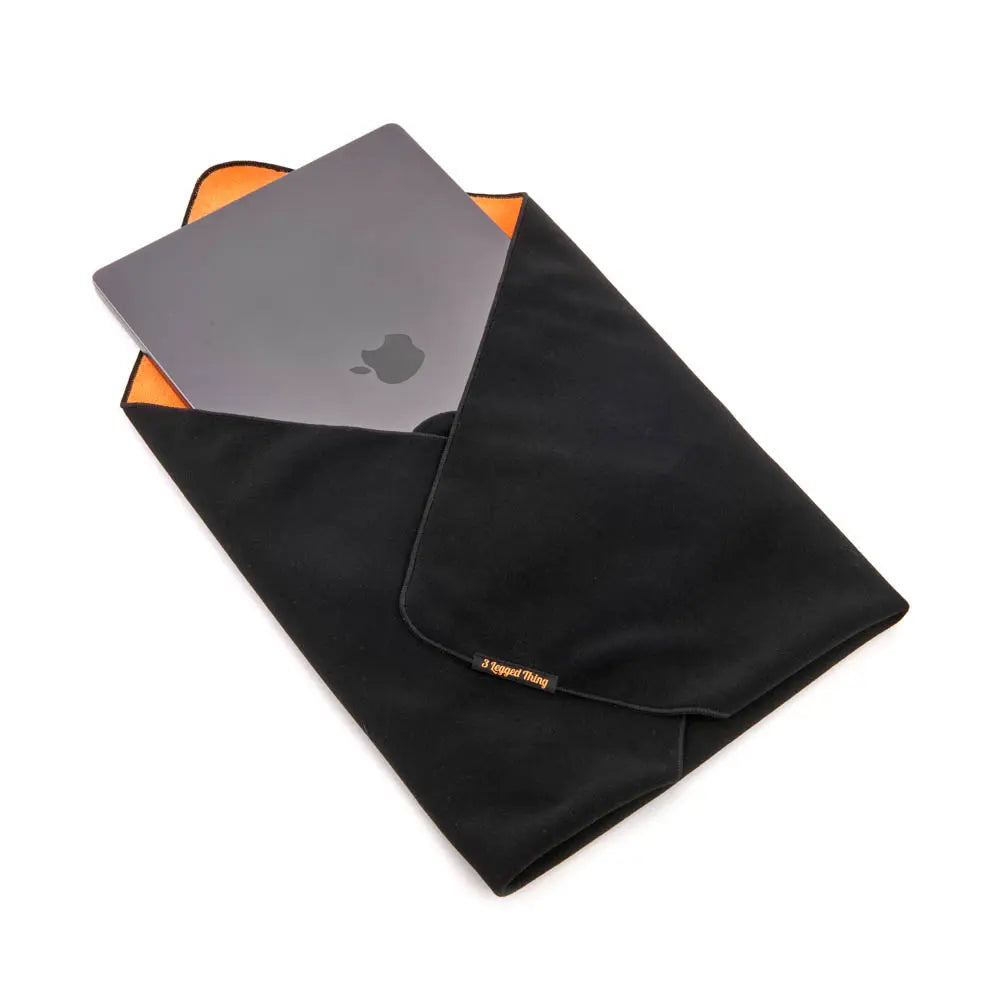 Black cooling towel with a gray card on a white background