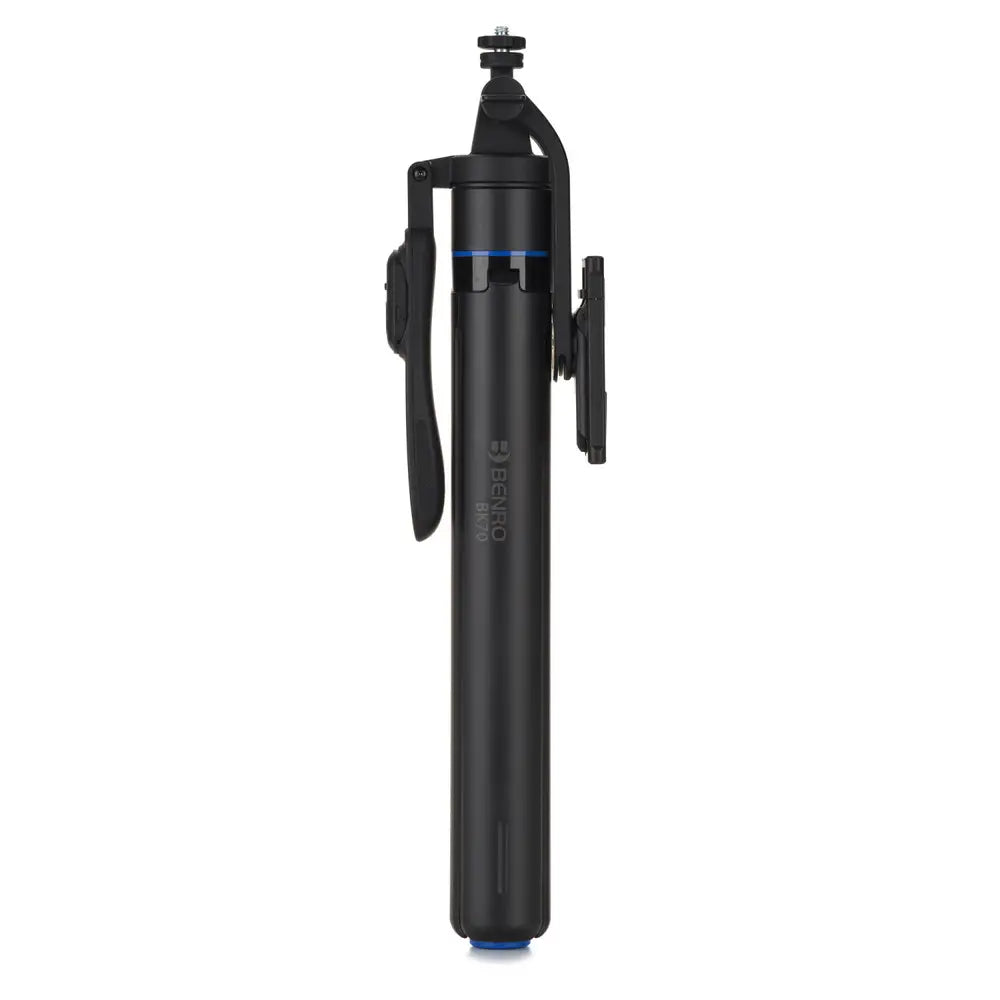 Black selfie stick with clip on a white background
