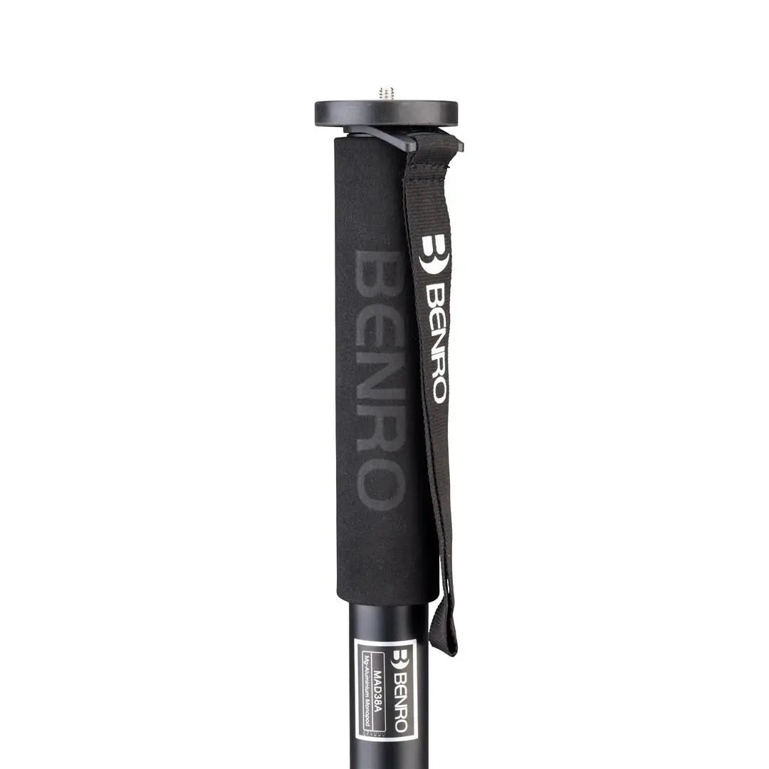 Black Benro camera monopod on a white background