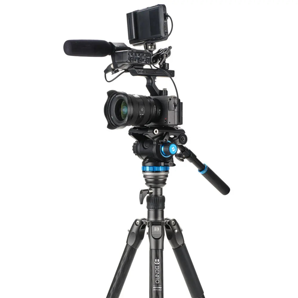 Professional camera on a tripod with a white background
