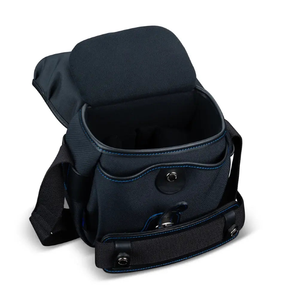 Black bag with a shoulder strap on a white background