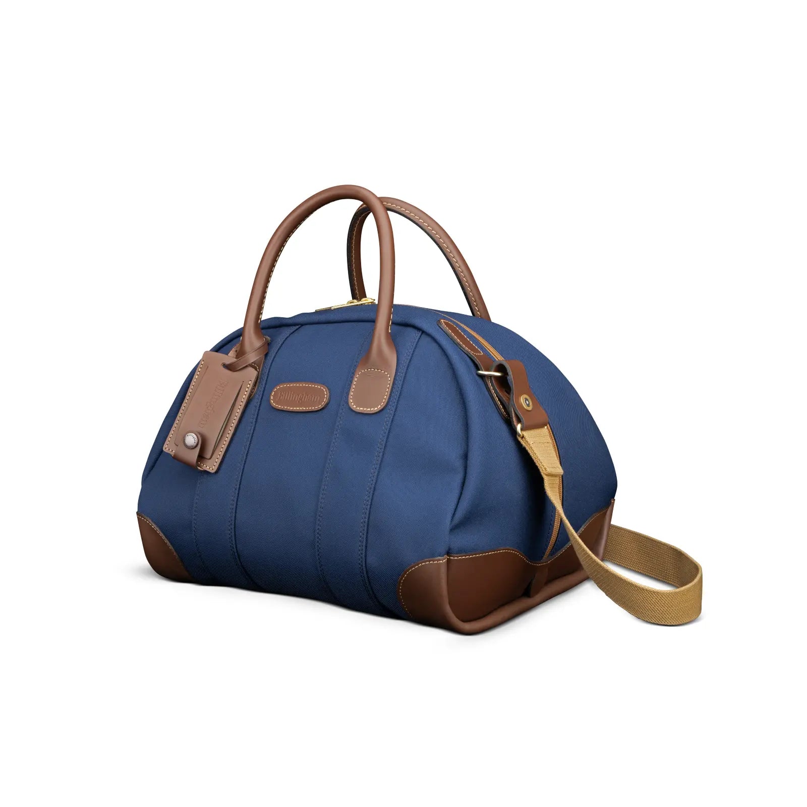 Blue handbag with brown handles and strap on a white background