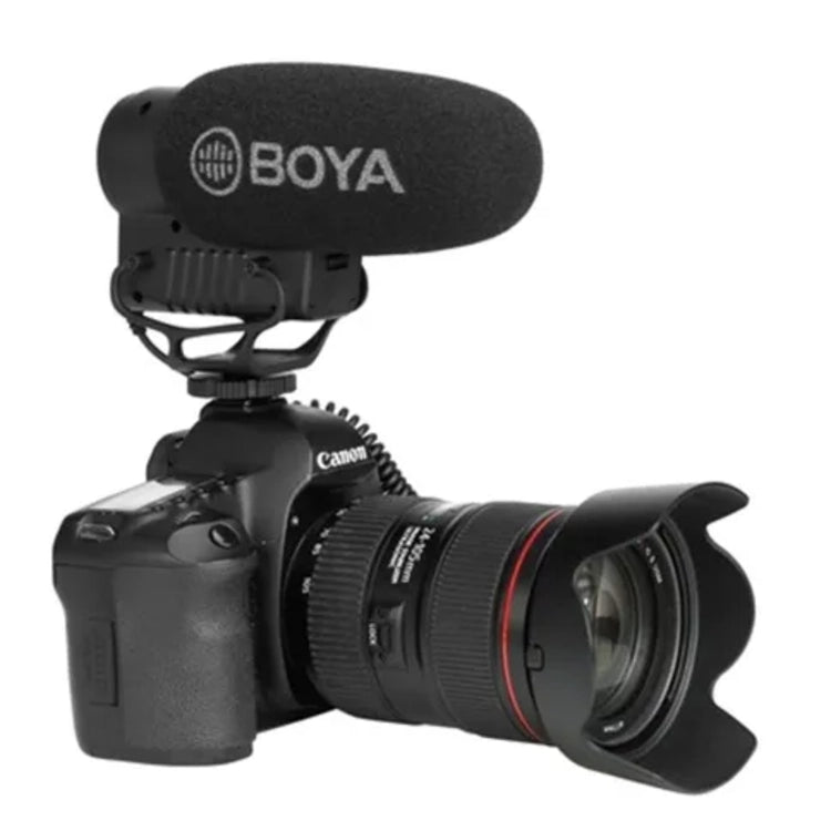 Camera with a BOYA microphone on a white background