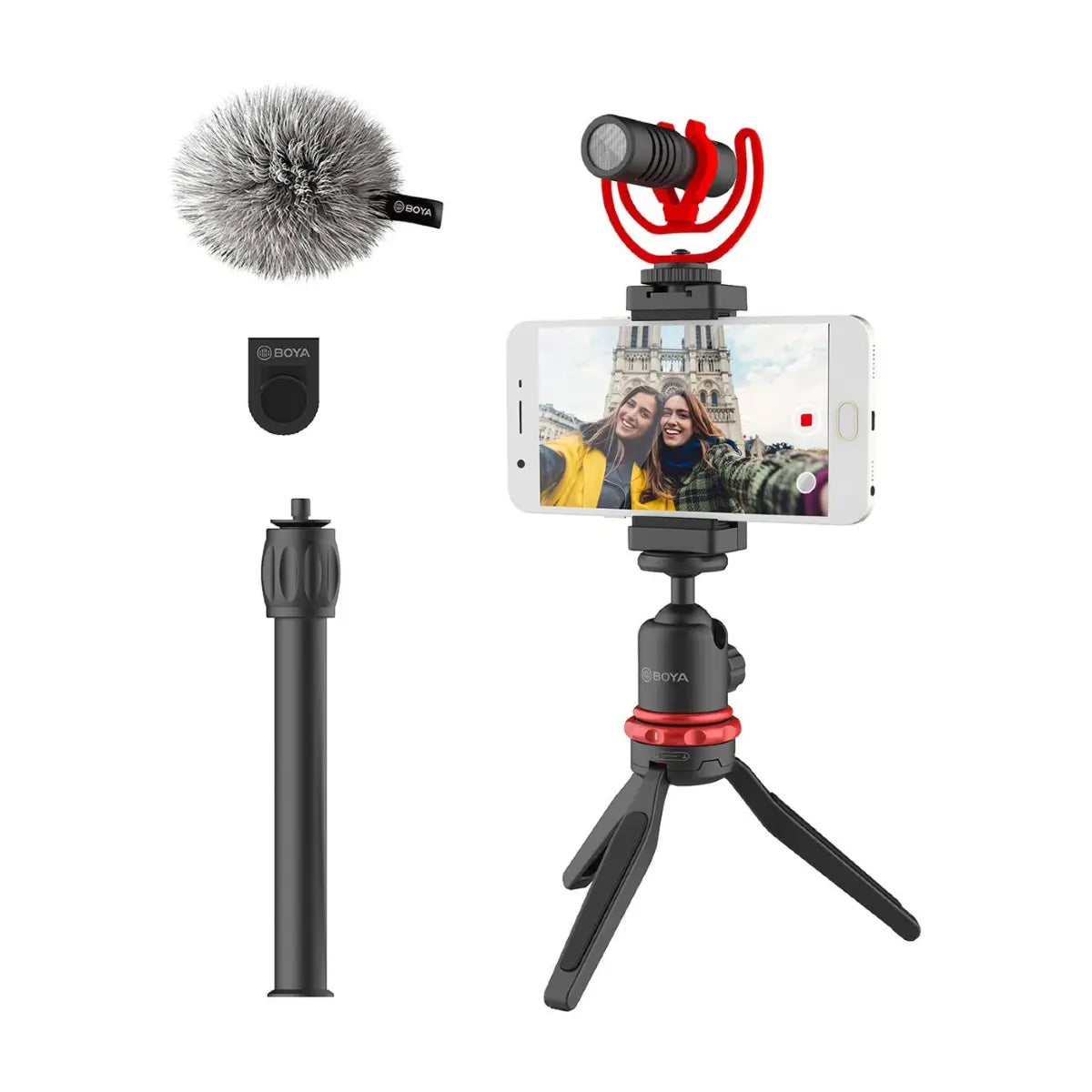 Video recording setup with smartphone, microphone, and tripod on a white background
