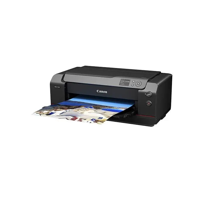 Canon printer with a photo being printed on a white background
