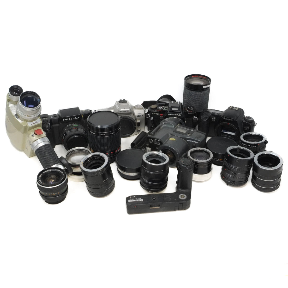 Collection of cameras and lenses on a white background