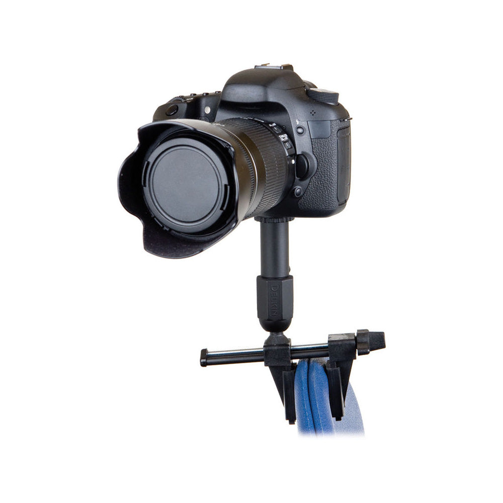 Camera with a microphone attachment on a white background