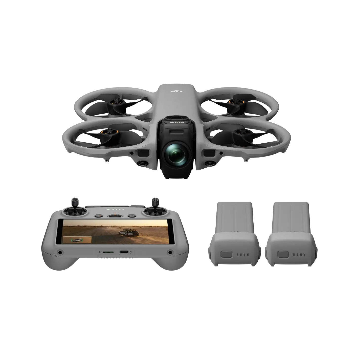 Drone with camera, remote control, and batteries on a white background