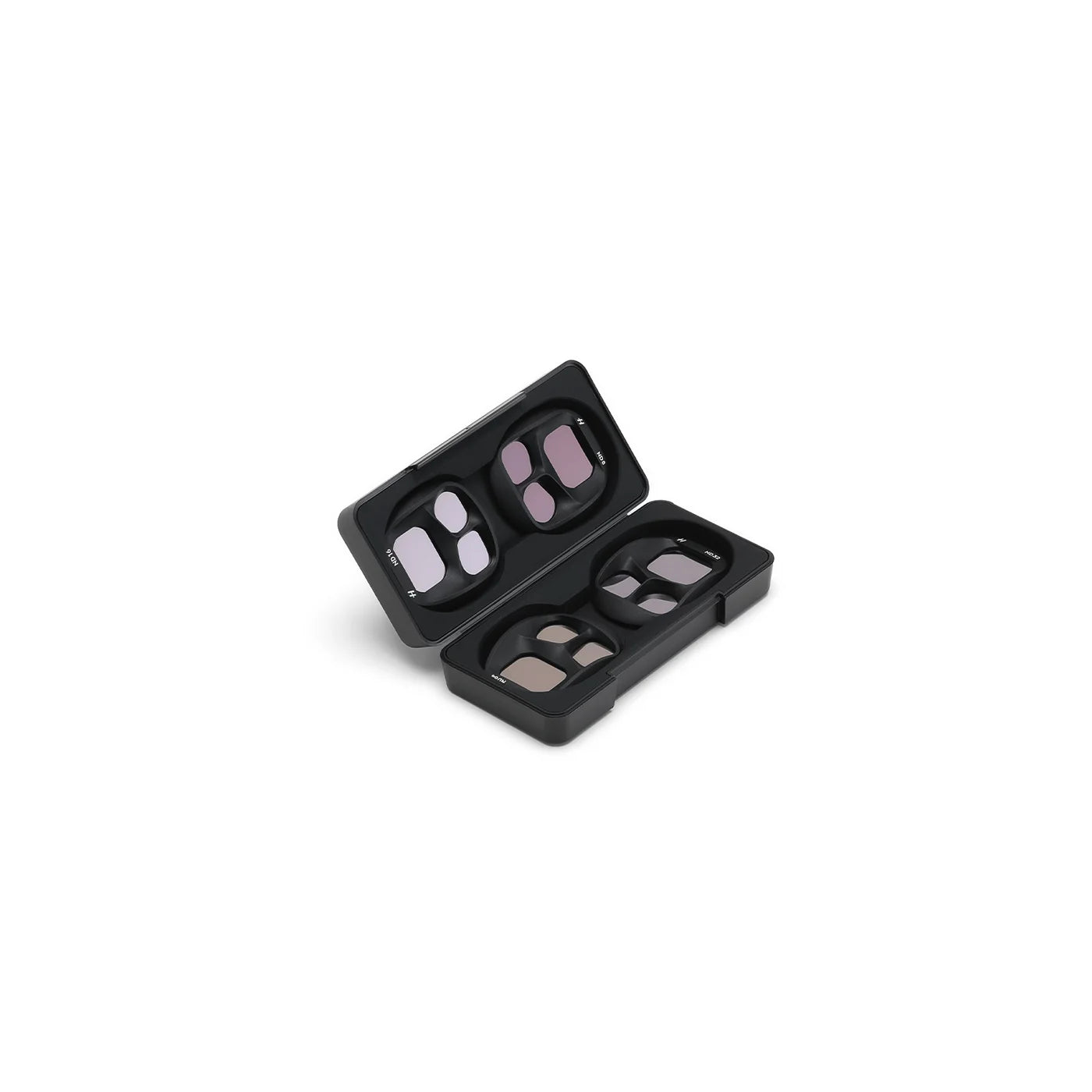 Set of phone camera lens covers in a black case on a white background