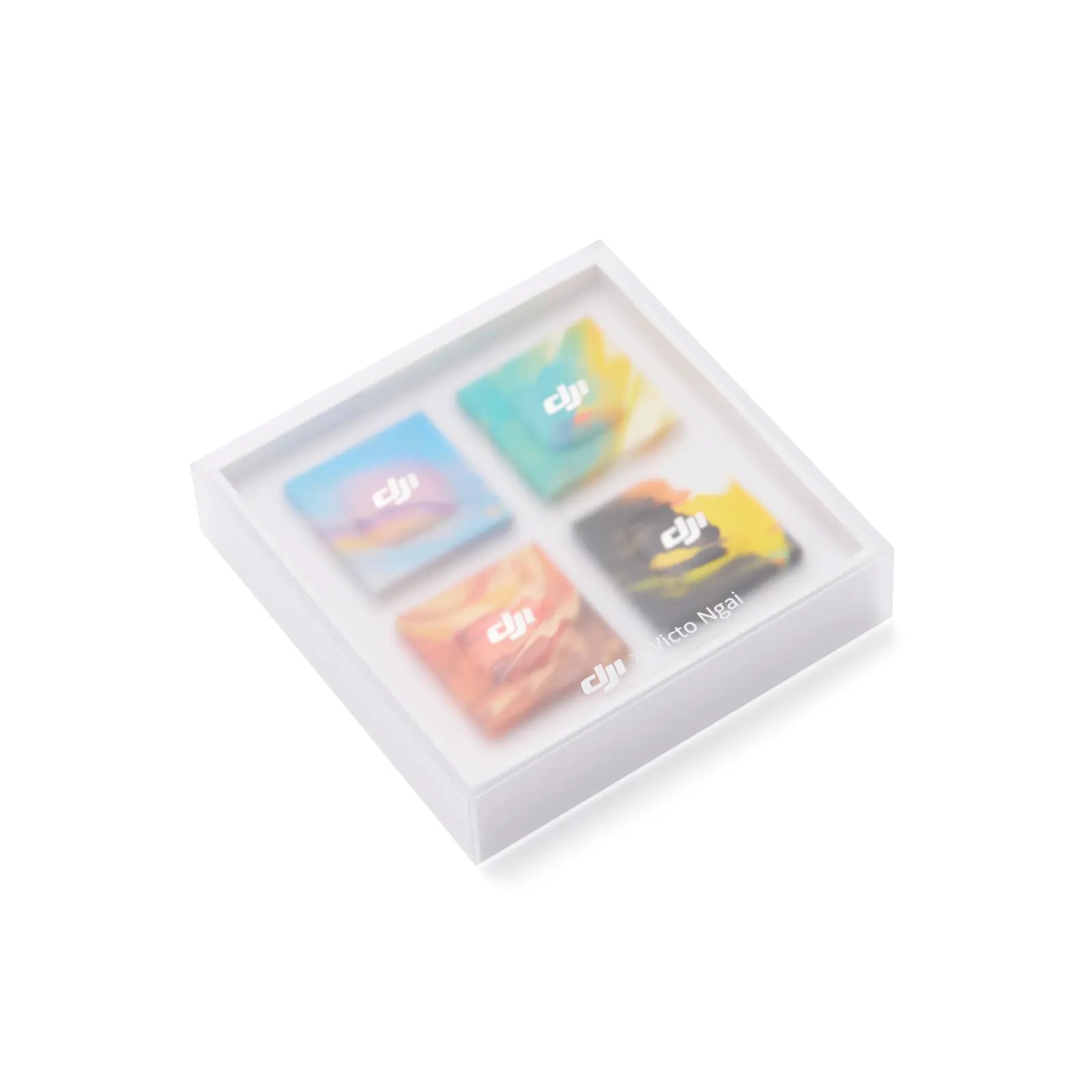 Four colorful cards with DJI logo in a white box on a white background