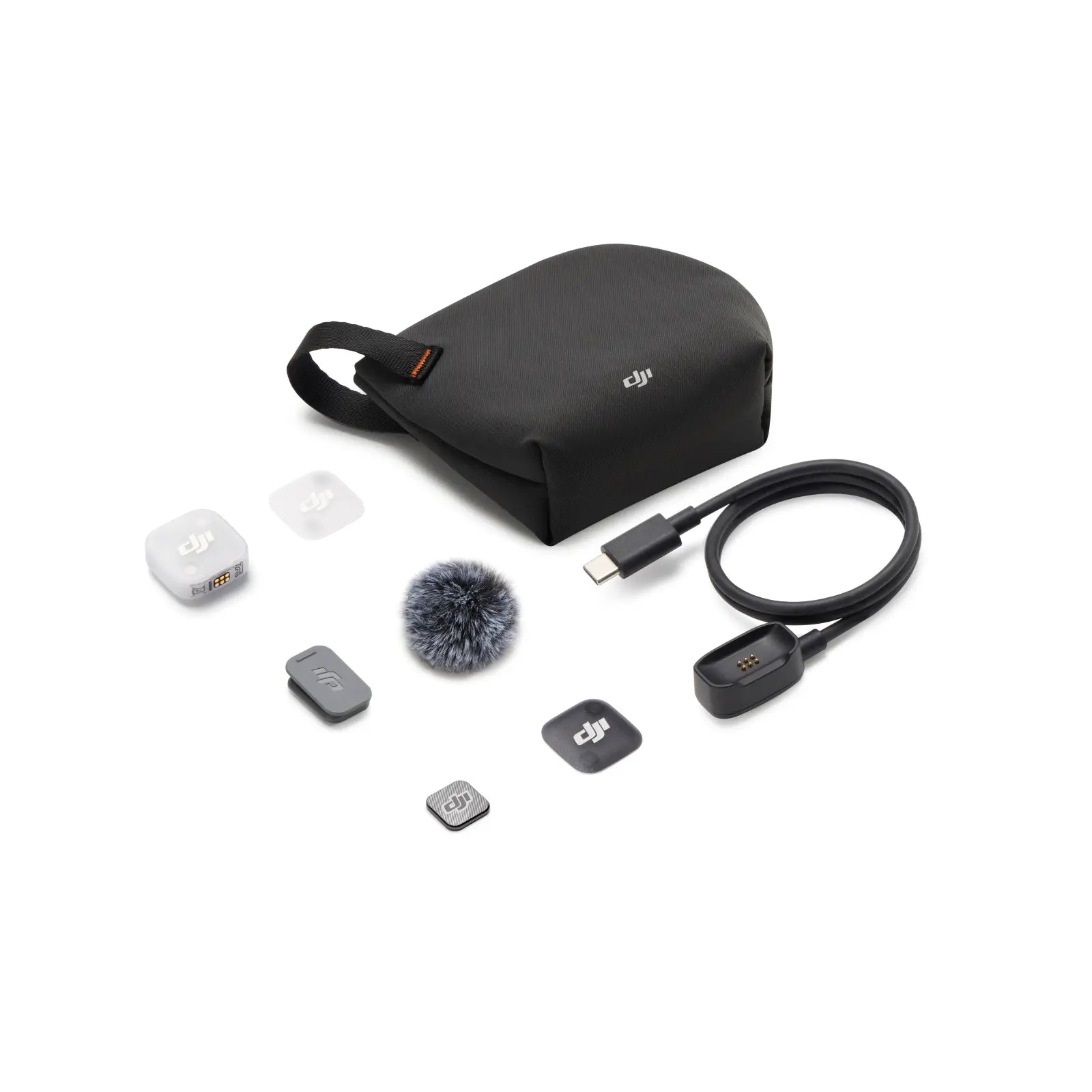 DJI accessory kit with black carrying case and various small components on a white background
