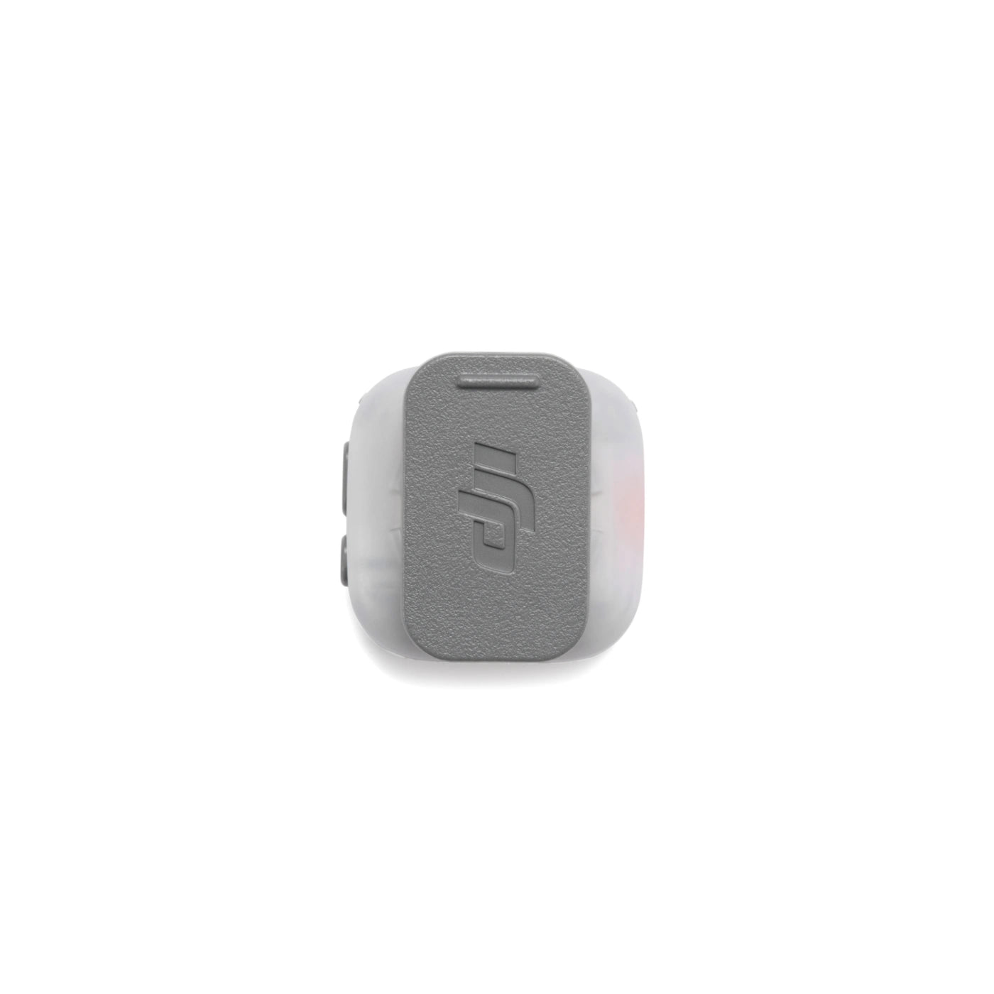 A small gray microphone with a debossed DJI logo, shown from above on a clean white background.