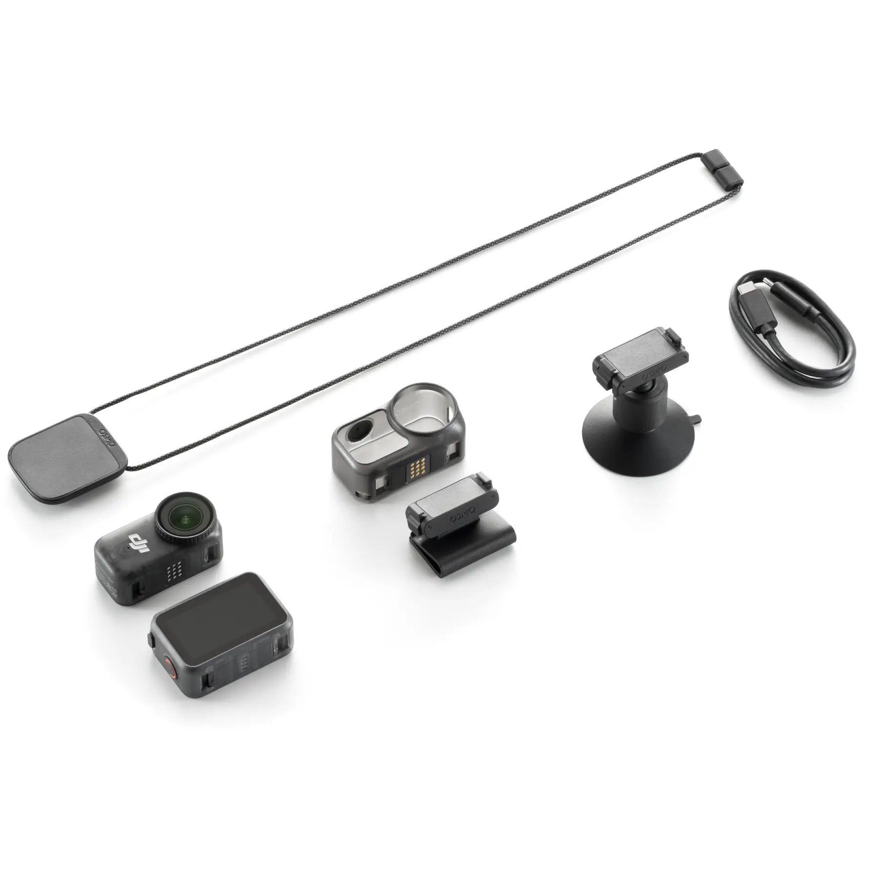 Collection of black electronic devices and accessories on a white background