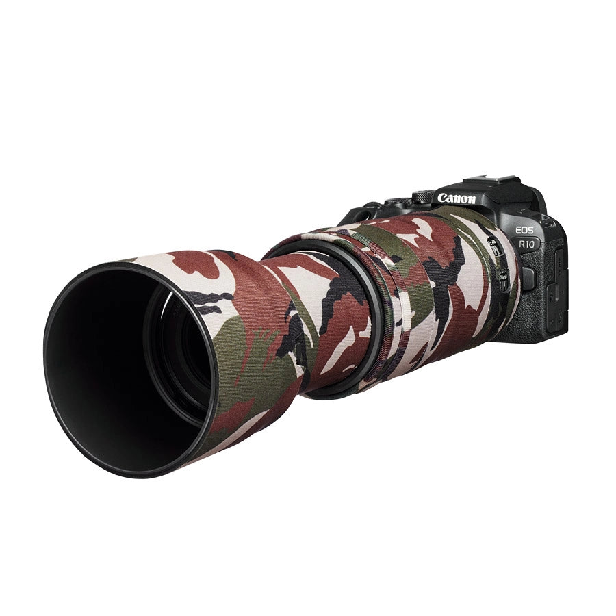 Canon camera with a camouflage lens cover on a white background