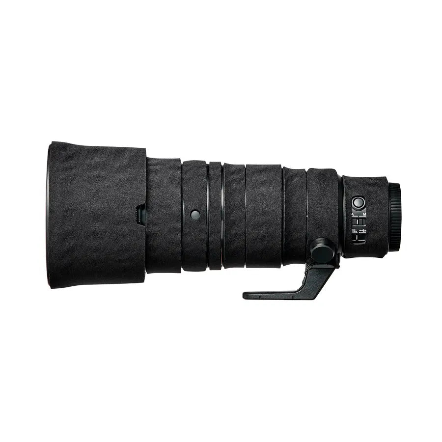Black camera lens on a white background