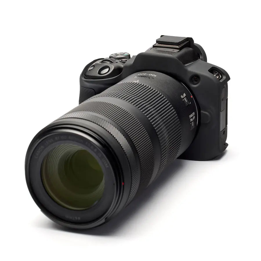 Camera with a large lens on a white background