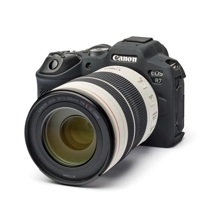 Canon EOS R7 camera with lens on a white background