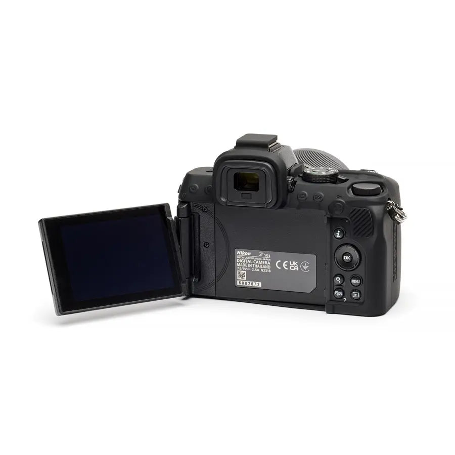 Digital camera with open flip-out screen on a white background