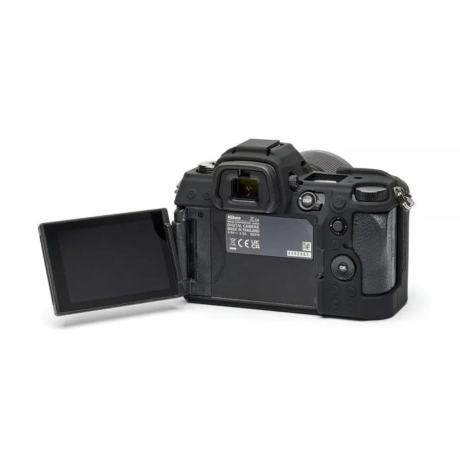 Black camera with open LCD screen on a white background