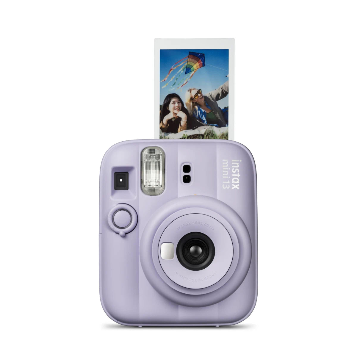 Lavender instant camera with a photo of two people and a kite on the instant print.