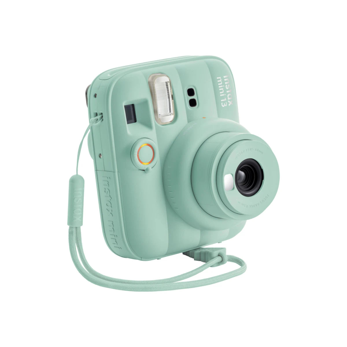 Mint green instant camera on a white background