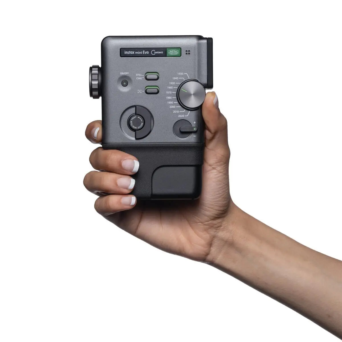 Hand holding a small electronic device with a white background