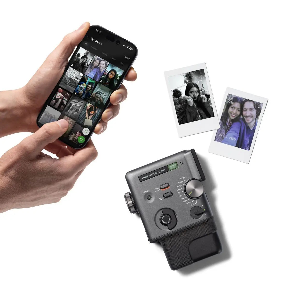 Hand holding a smartphone with photo app, next to a camera and instant photos on a white background