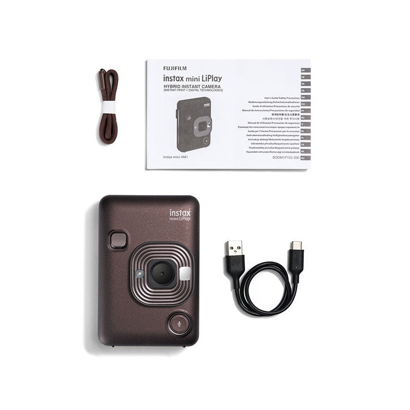Fujifilm instax mini LiPlay camera with USB cable and packaging on a white background