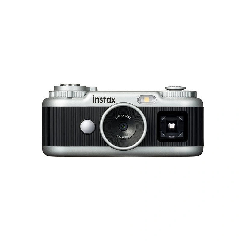 A silver and black Instax MiniCam compact camera shown from the front against a plain white background.