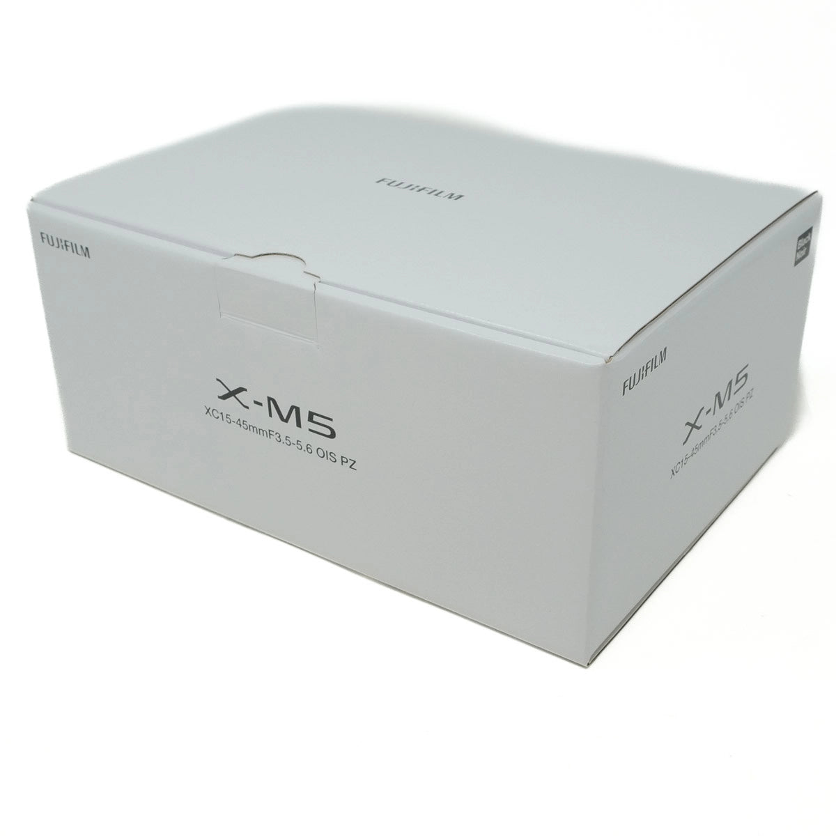 White camera lens box with 'X-M5' branding on a white background