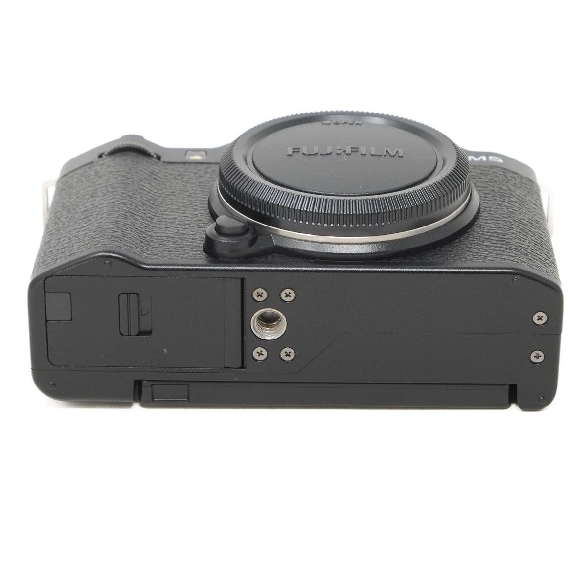 Bottom view of a black Fujifilm camera on a white background