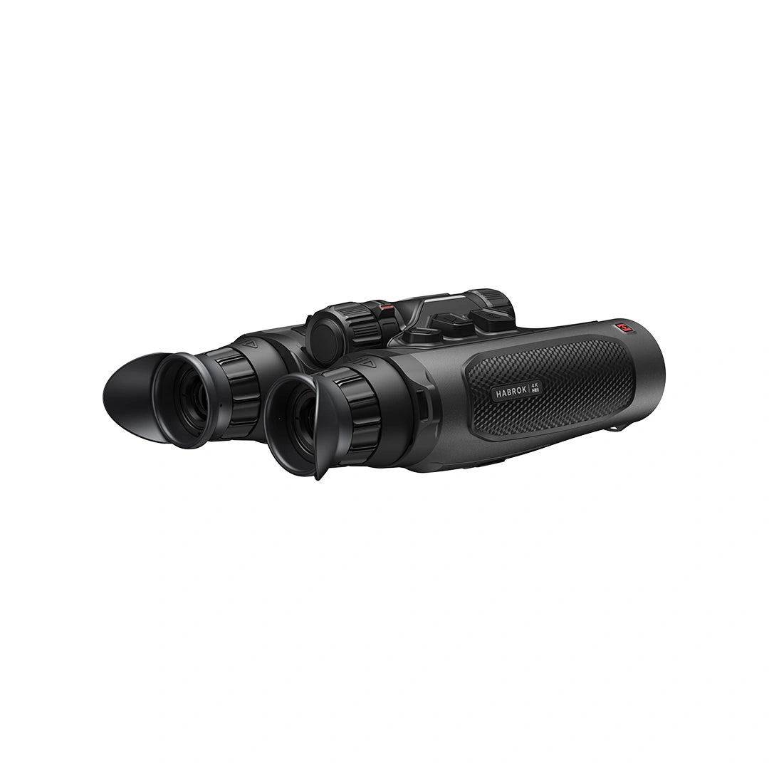 Black binoculars photographed from above on a plain white background.