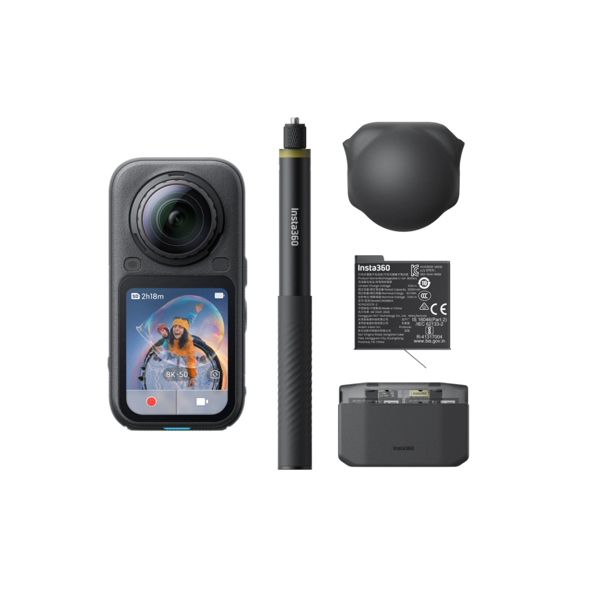 Insta360 action camera shown with accessories on a plain white background: a black protective dome, a black stylus, a battery, and a charging dock. The camera body is dark gray/black, and the accessories are also black with small gold and blue details.