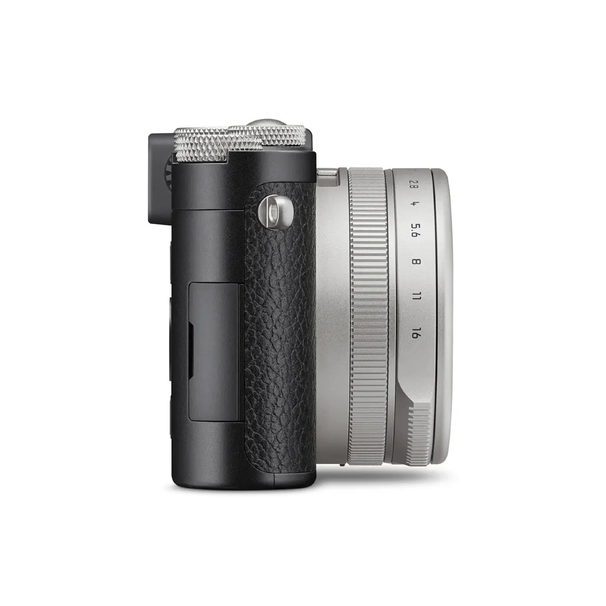 Side view of a camera with black body and silver lens on a white background