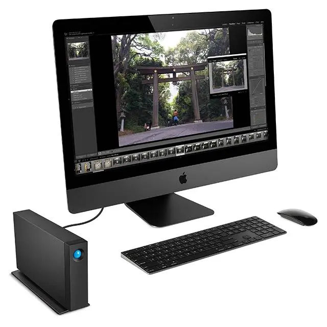 Computer setup with monitor, keyboard, and mouse on a white background