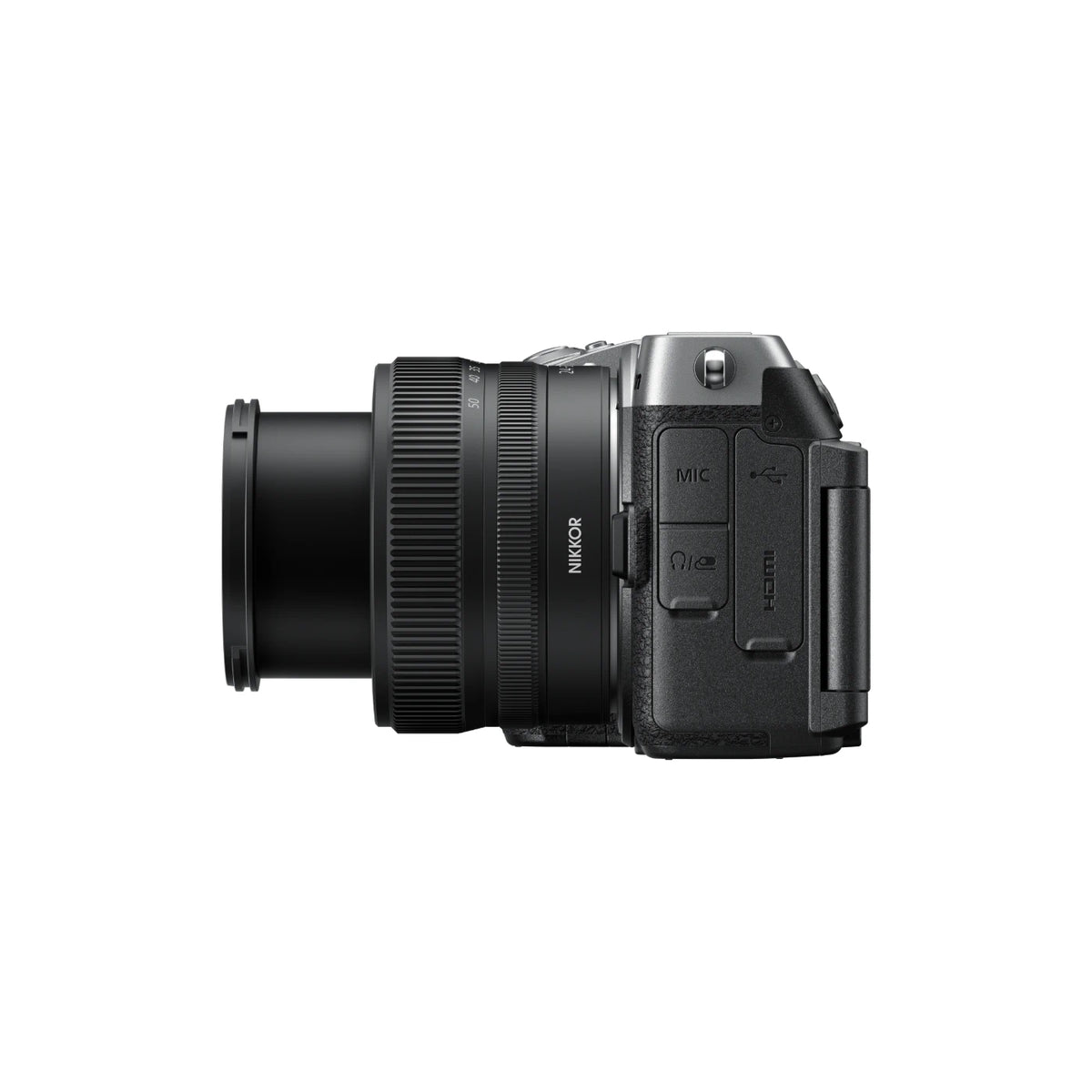 A Nikon mirrorless camera with an attached lens, shown from a side profile view against a solid white background.