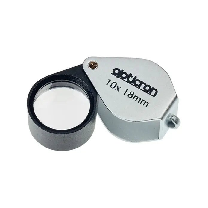 Ocultron magnifying glass with 10x and 18mm specifications on a white background
