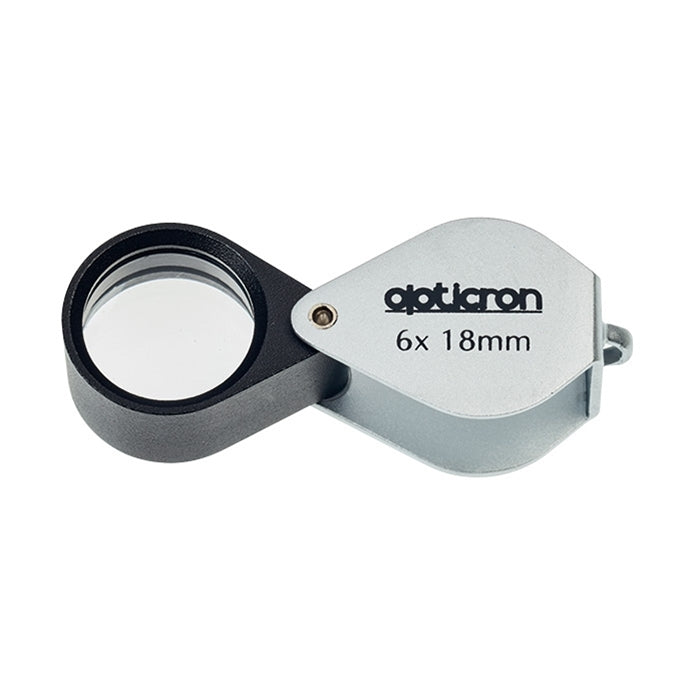 Opticon magnifying glass on a white background