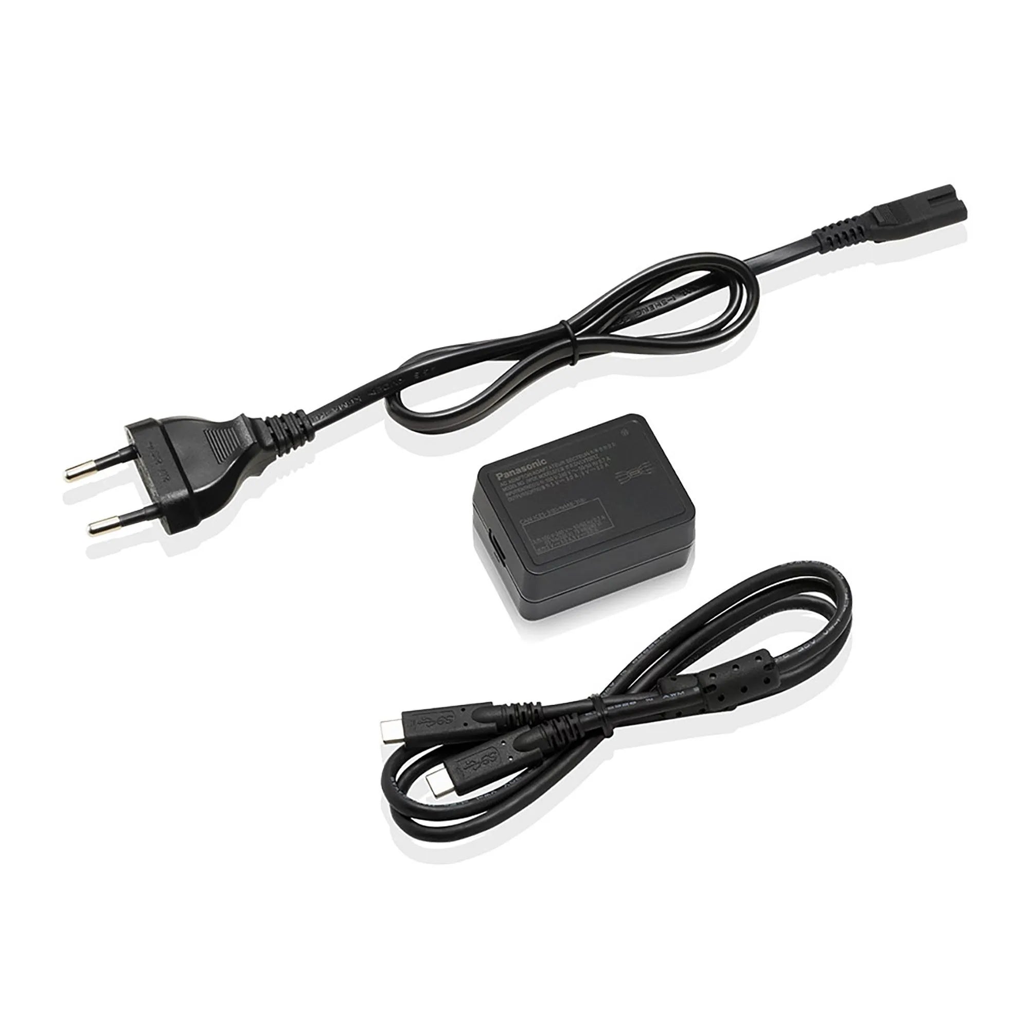 Black power adapter with plug and USB cable on a white background