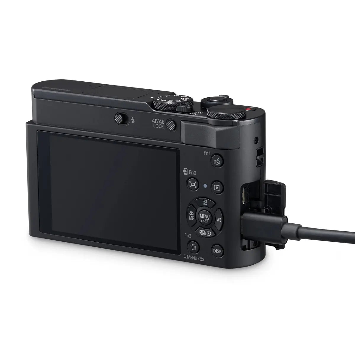Black digital camera with a cable attached on a white background