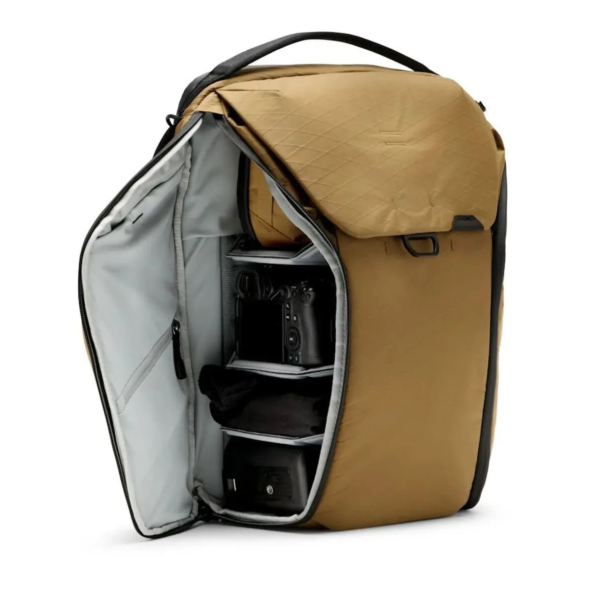Open tan backpack with compartments on a white background