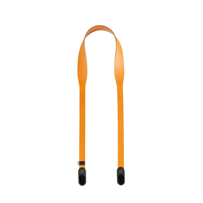 Bright orange leather camera strap with black plastic buckles, shown vertically on a plain white background.