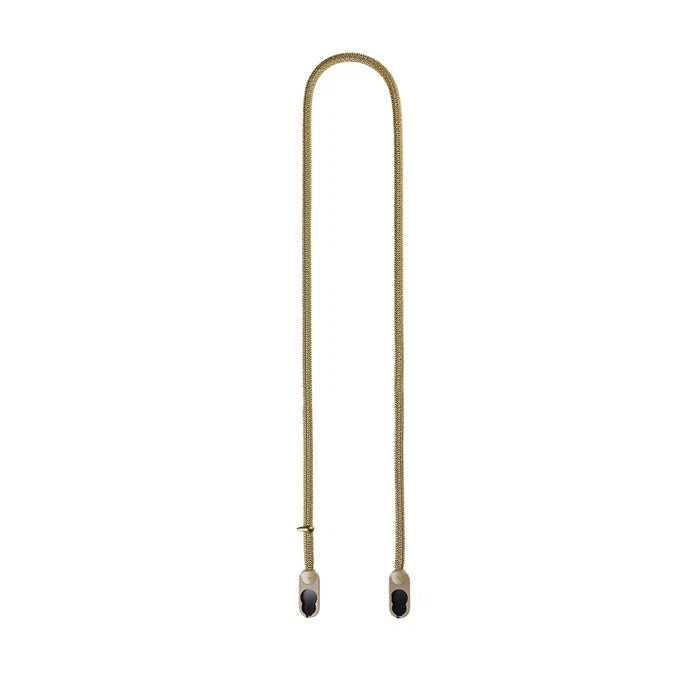 A long, thin braided cord or strap in a muted tan/khaki color, shown vertically against a plain white background. The cord has small dark and light end caps at the bottom.