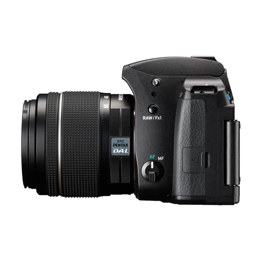 Black camera with lens on a light gray background