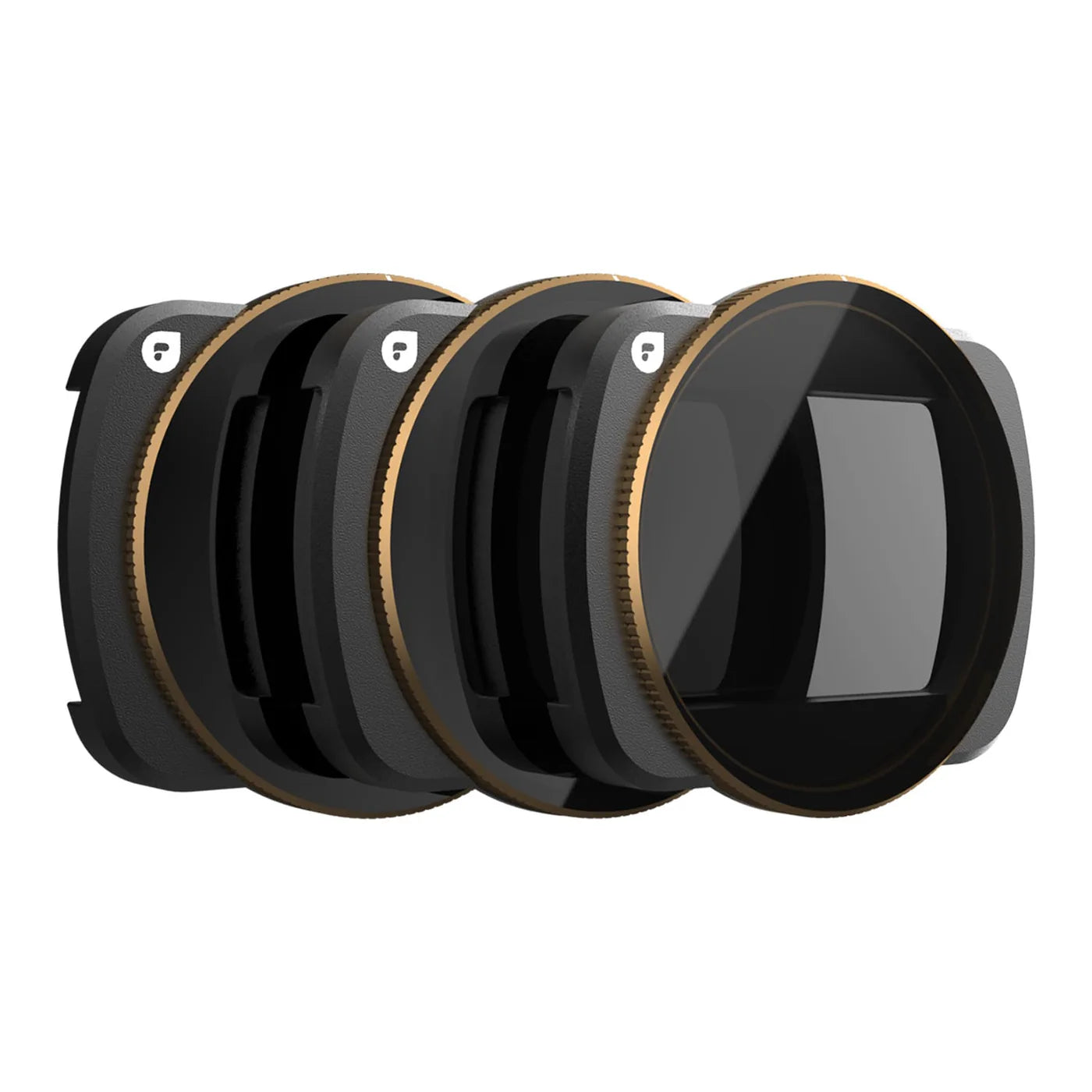 Set of four black camera lens filters with gold accents on a white background