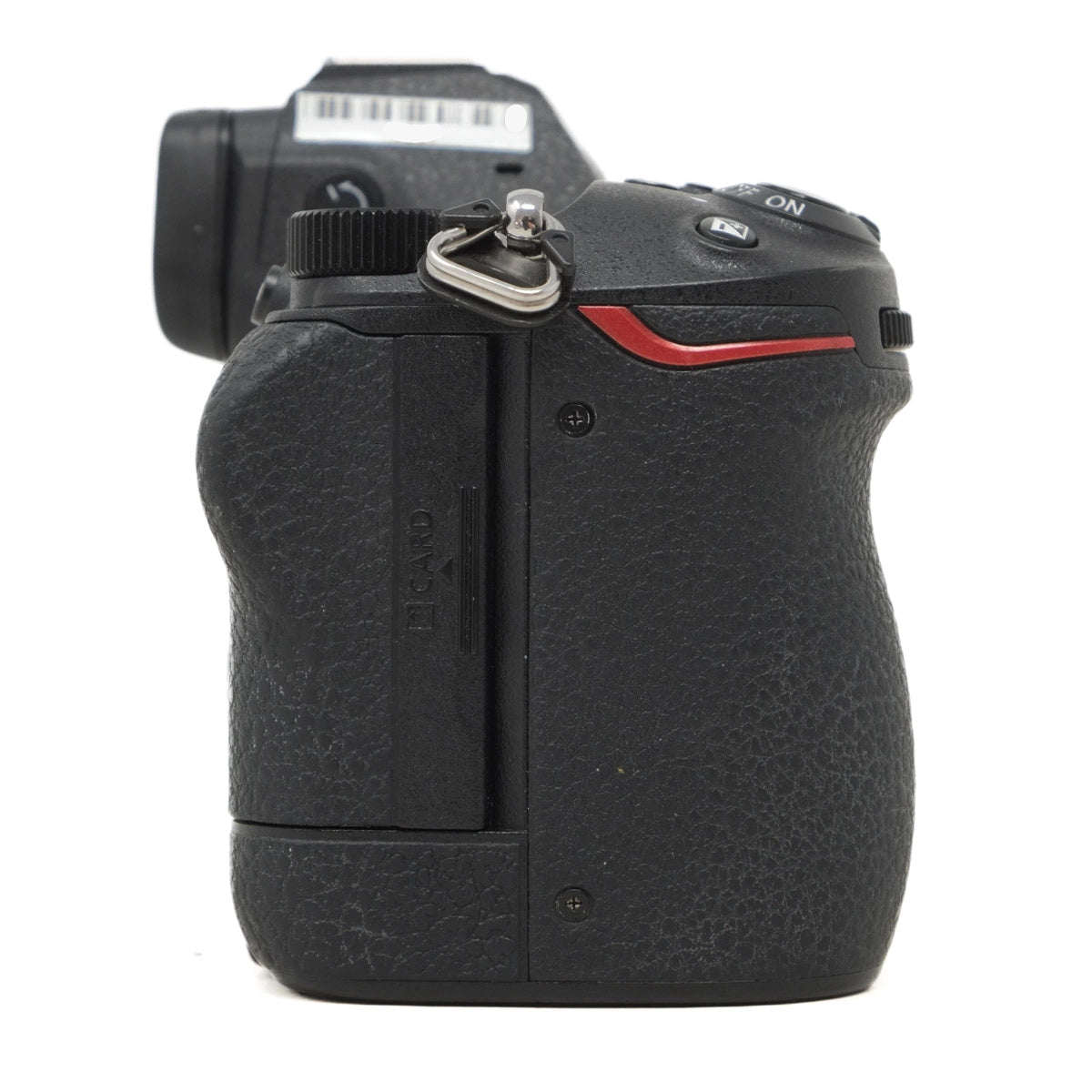 Black camera body with textured grip on a white background