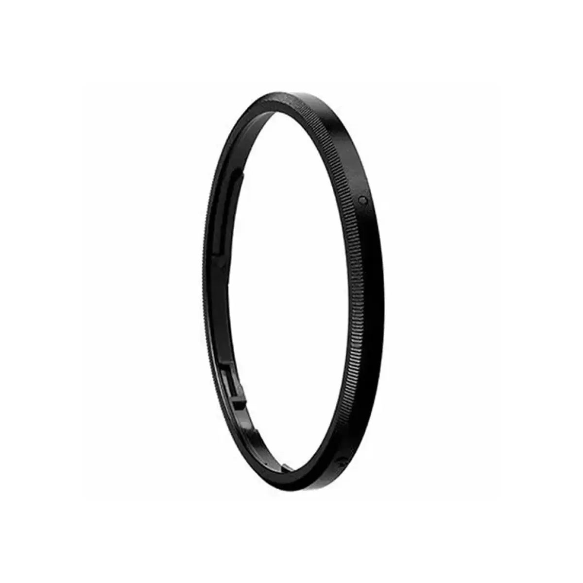 Black camera lens filter on a white background