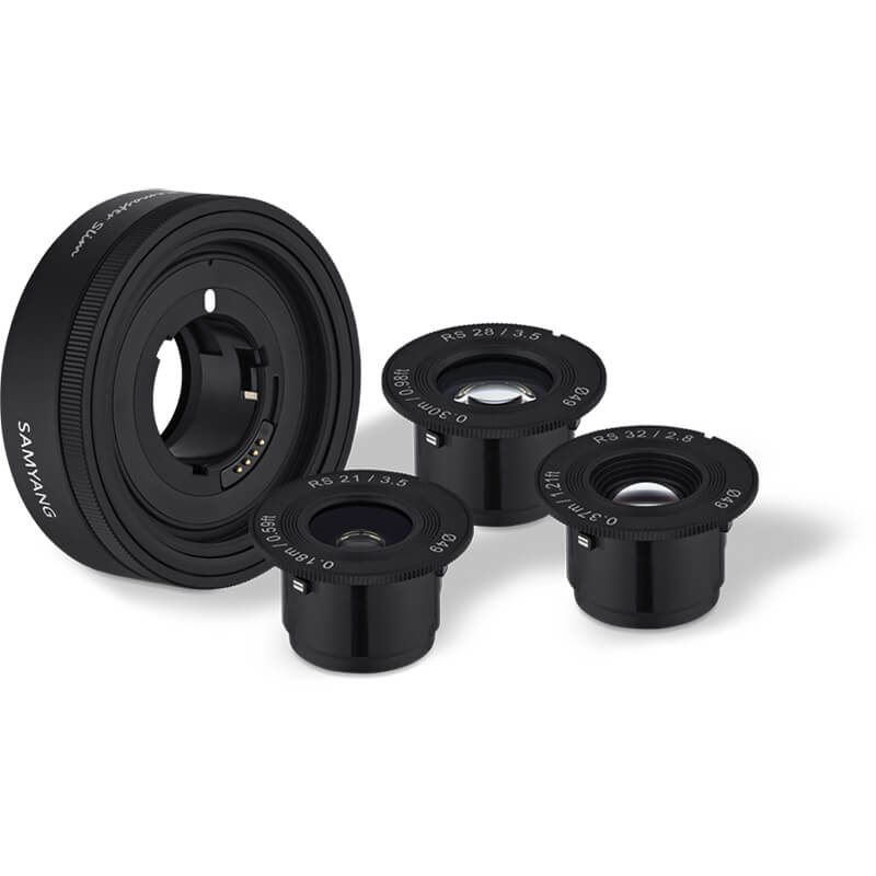 Set of black camera lens components on a white background