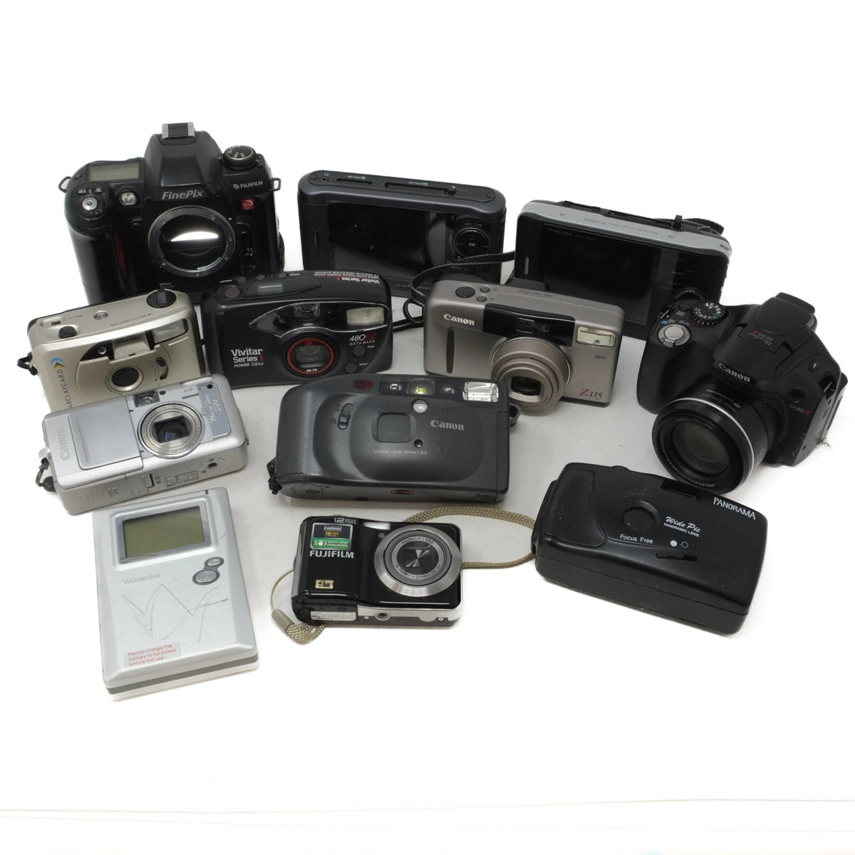Collection of various cameras on a white background