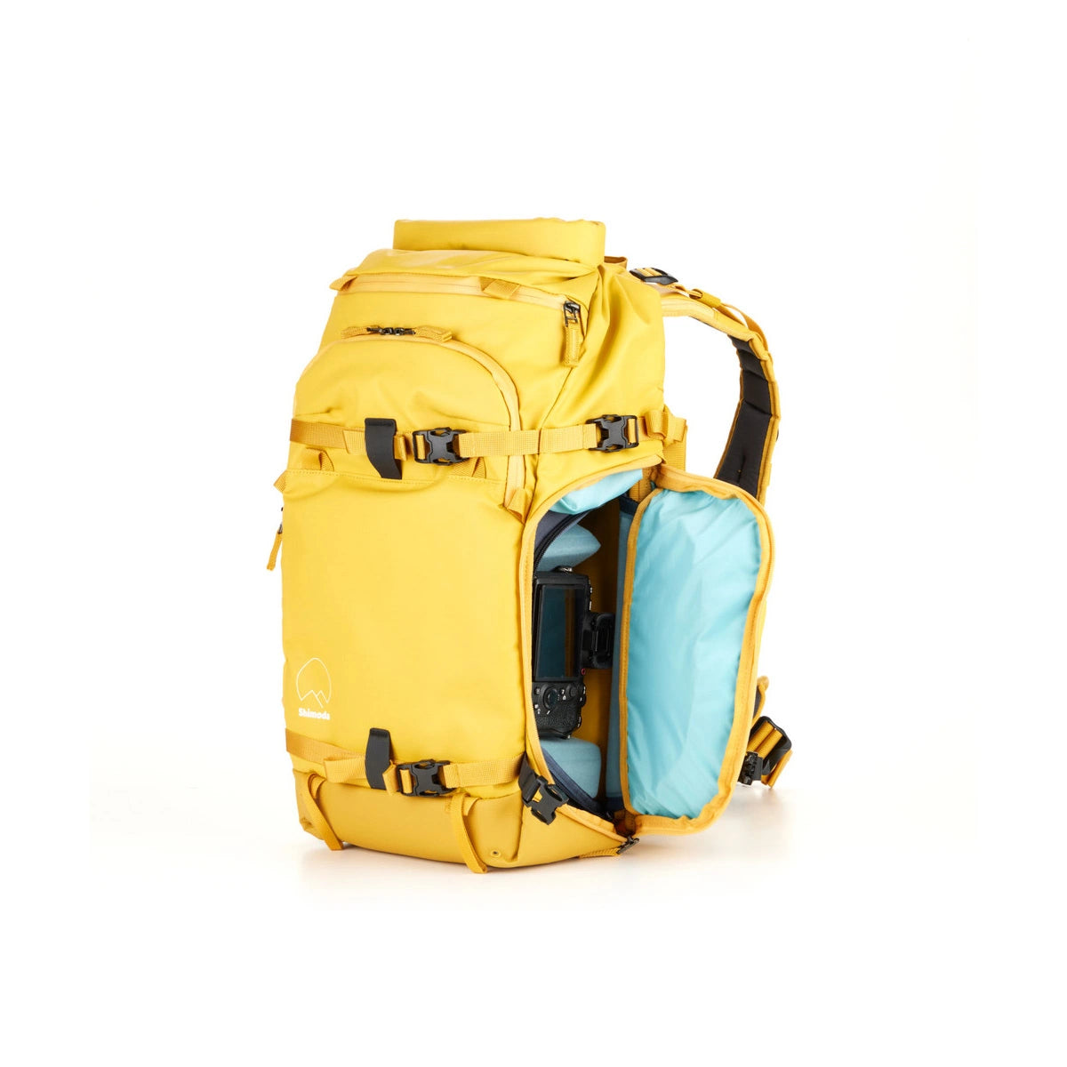 A yellow technical backpack with an open side pocket revealing a light blue inner compartment and a camera inside, set against a plain white background.